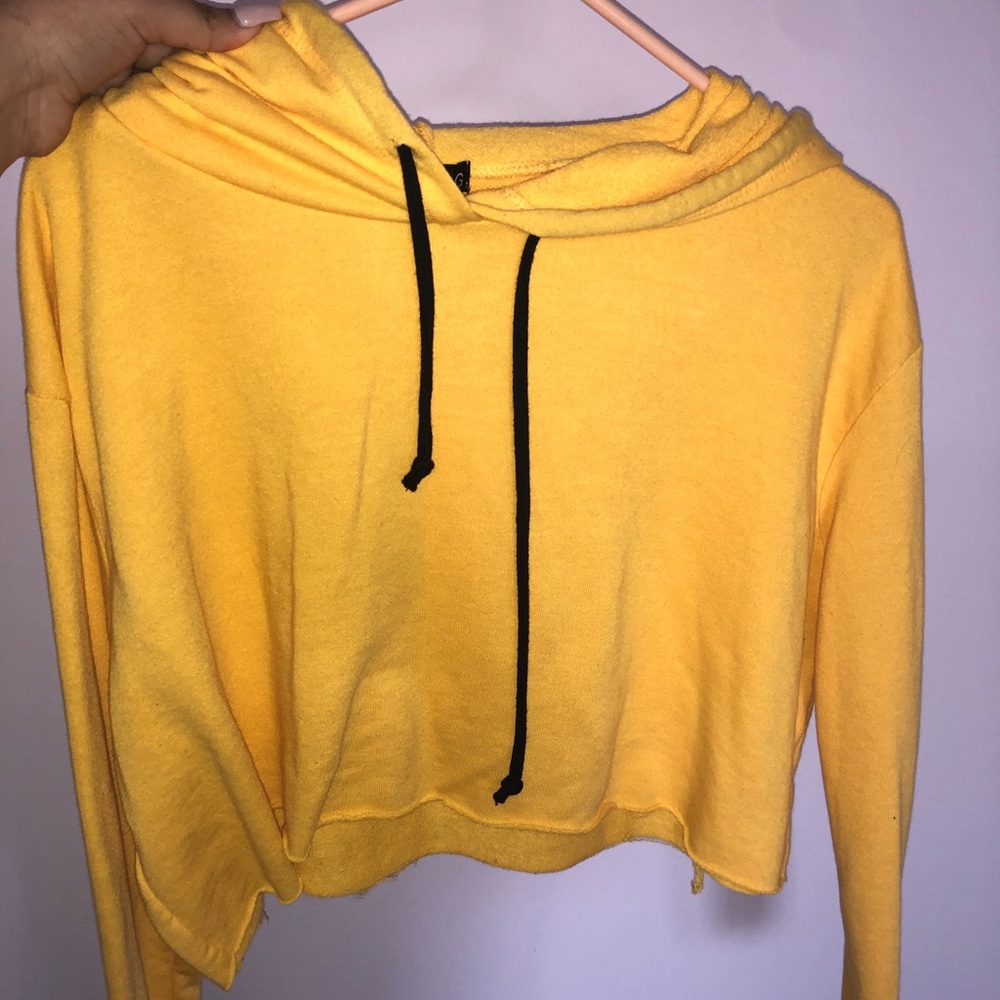 A crop top yellow long sleeve